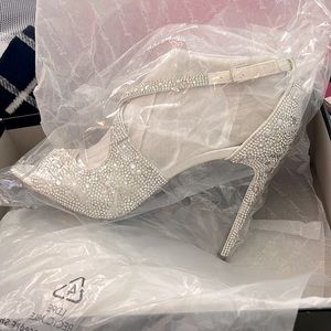 Brand new, never worn Betsy Johnson shoes.